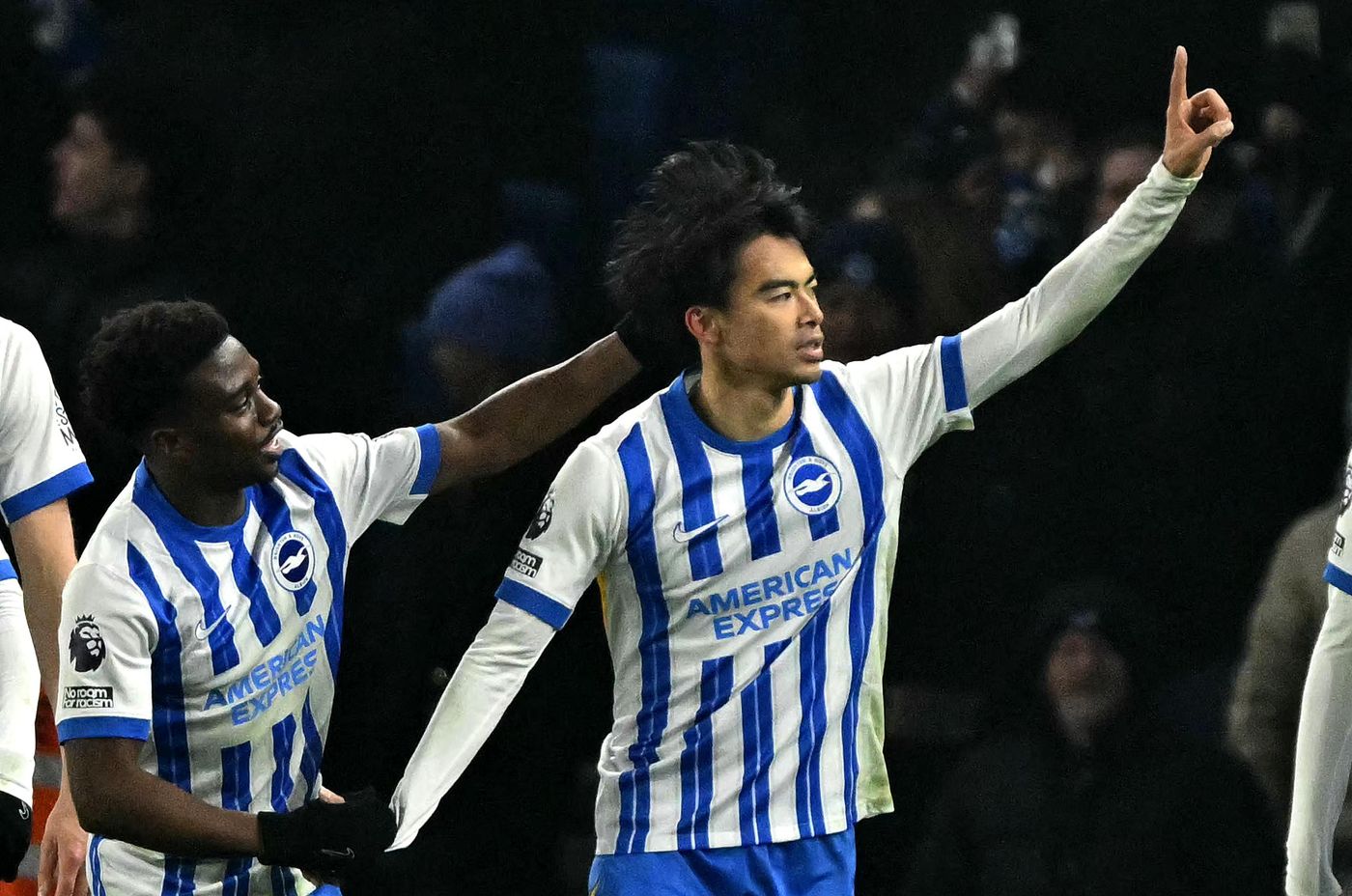 Mitoma celebrating with his teammates