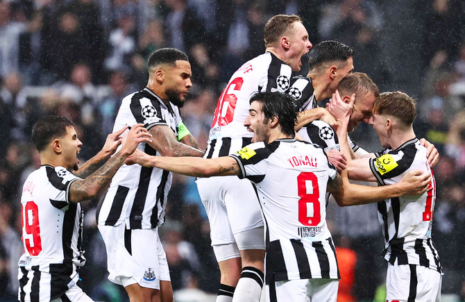 Newcastle's players celebrating their great performance in Group F thus far