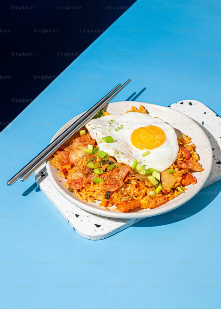Mastering the Art of Fried Rice: Recipes, Techniques, and Tips for Irresistible Delights 3 | Mania Africa | maniainc.com Using eggs or bacon as your accompanying ingredient for fried rice | Mastering the art of fried rice | Mania Inc.
