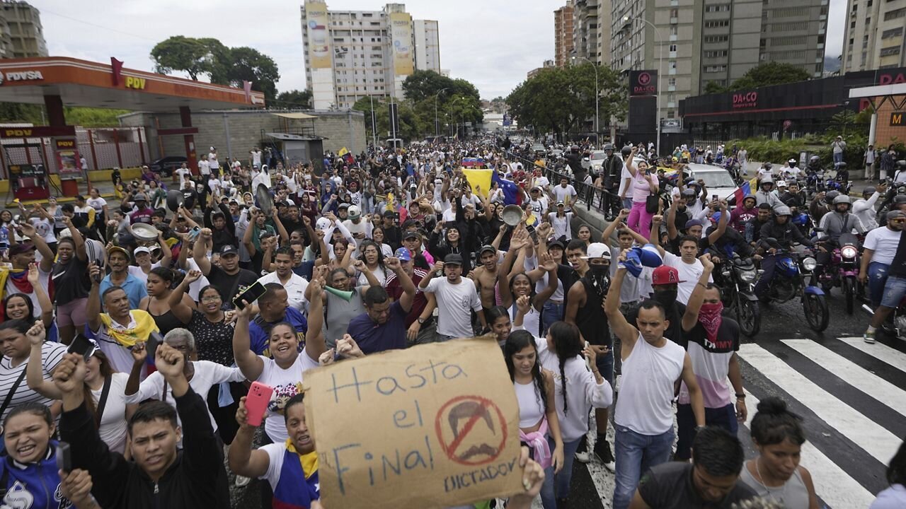 The Fall of Nicolas Maduro? Unrest Erupts in Venezuela Following Maduro's Re-Election 8 | Mania Africa | maniainc.com Protestors in Caracas after unrest erupted following the announced re-election of Nicolas Maduro | The Fall of Nicolas Maduro? Unrest Erupts in Venezuela Following Maduro