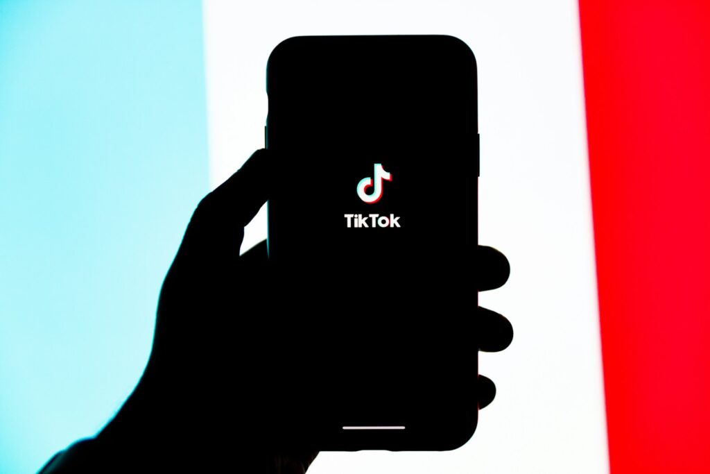 TikTok 'Goes Dark': TikTok App Taken Down in the US Plus How to Regain Access 2 | Mania Africa | maniainc.com A phone showing the TikTok app logo - TikTok Shutdown after US Ban - Mania News